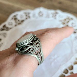 Vintage ornate silver color metal (pewter?) ring with mother of pearl.